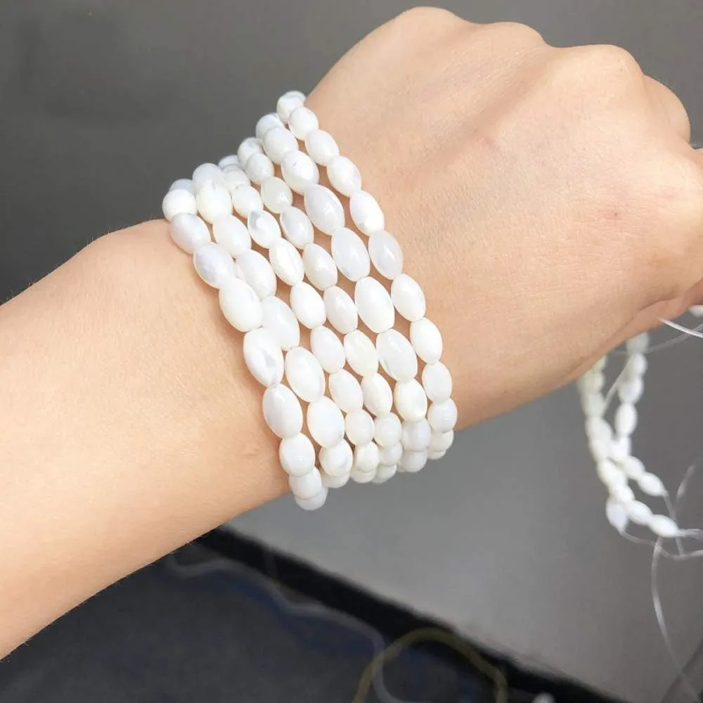 HAAMIIQII 6x9mm Natural Rice White Mother of Pearl Shell Beads Loose Gemstone Beads for Jewelry Making Strand 15 Inch (40-44pcs)